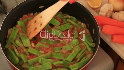 cooking green beans in pan