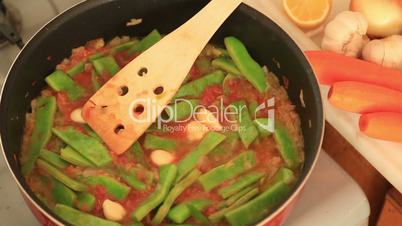 cooking green beans in pan