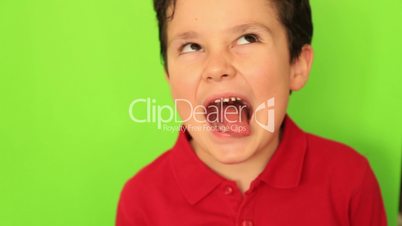 Child making funny faces at camera