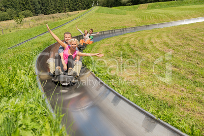 couples enjoying alpine coaster luge