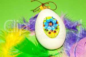 Easter egg and bird feathers