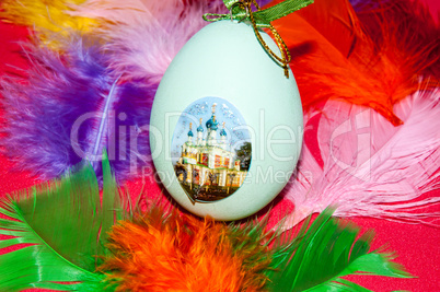 Easter egg and bird feathers