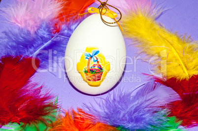 Easter egg and bird feathers