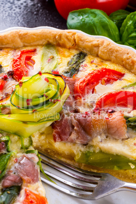 green asparagi tart with eggs and tomato