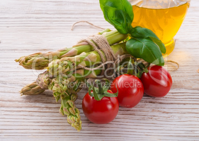 asparagus tomatoes oil
