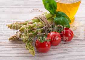 asparagus tomatoes oil