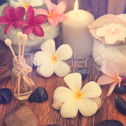 spa treatment setting with frangipani