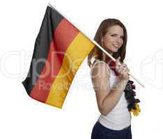 attractive woman shows german flag and smiles in front of white background