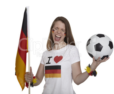 attractive woman shows german flag and football and screams in front of white background