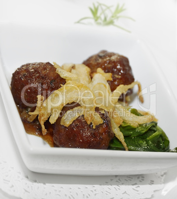 meatballs with onion and spinach