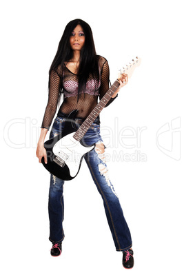 girl holding her guitar.