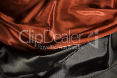 Shiny black and red satin fabric