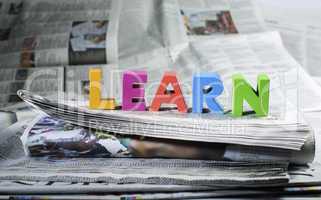Word learn on newspaper
