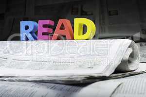 Word read on newspaper