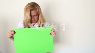Sad Woman Holding Onto A Green Screen