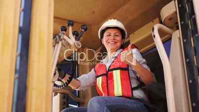 Industrial Female Grader Thumbs Up