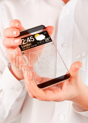 smartphone with transparent screen in human hands.