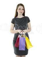 portrait of young happy smiling woman with shopping bags
