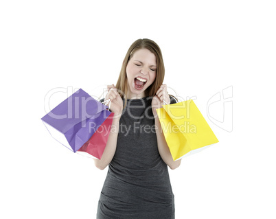 excited shopping woman shouting with shopping bags