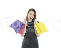 excited shopping woman shouting with shopping bags