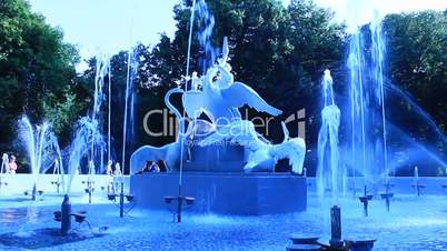fountains with beautiful swans in the park of lvov