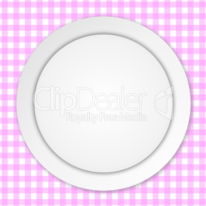 white plate on pink tablecloth