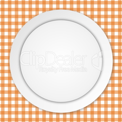 white plate on orange tablecloth