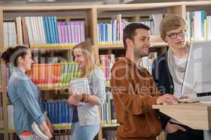 group of students discussing in library