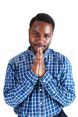 black man praying.