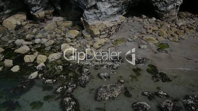 aerial shot of ocean cliffs
