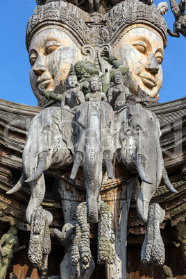 god and elephant wooden statue