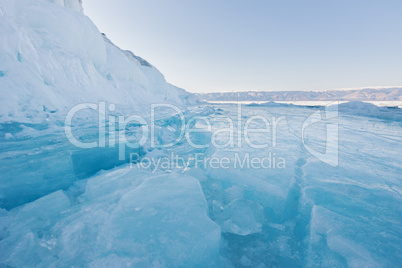 Winter,  lake and the rocks in ice