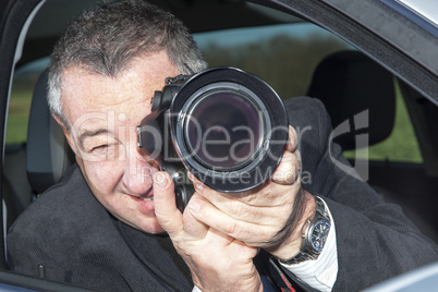 man photographed from the car