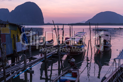 dusk in thai fishing village