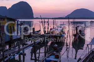 dusk in thai fishing village