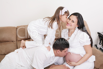 portrait of family expecting new baby to come