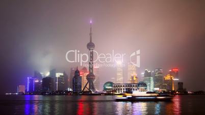 Time lapse of Shanghai skyline in drizzle night