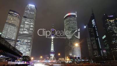 Shanghai landmark and city traffic at night