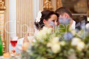 bride and groom share a special tender moment