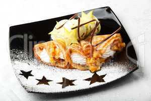 golden pancakes with carambola and cream