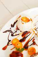 vanilla ice cream with sliced kumquats