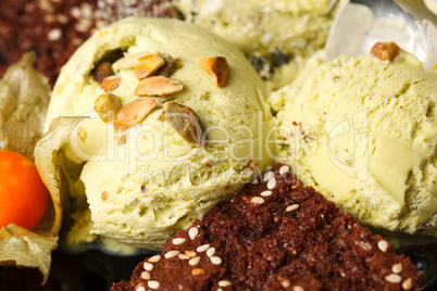 pistachio ice cream topped with nuts