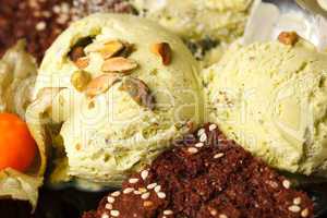 pistachio ice cream topped with nuts