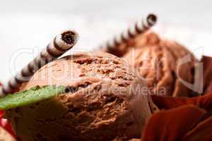 chocolate ice cream with striped wafer biscuits