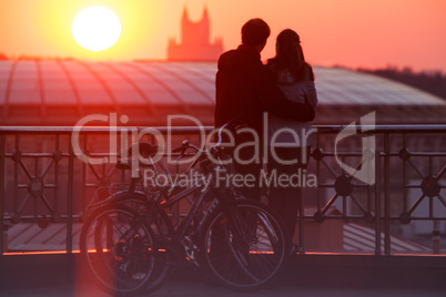 couple enjoying scenic sunset in the city