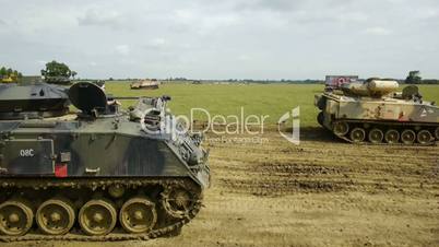 Tank driving through field