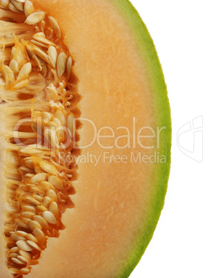 side of an orange honeydew melon