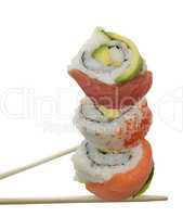 sushi rolls with red fish and avocado