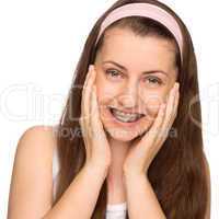 happy girl with braces isolated