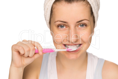 girl with braces brushing teeth isolated